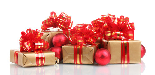 beautiful golden gifts with red ribbon and Christmas balls