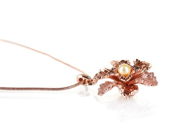 Pendant in form of flower with pearl  isolated on white