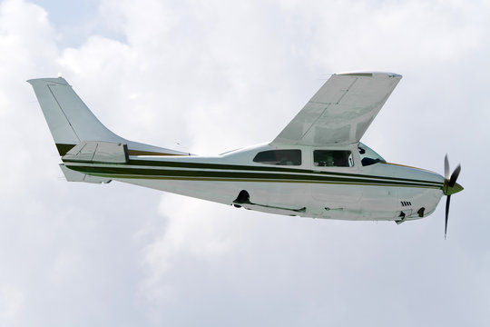 Small tourist plane over Caribbean beach in Mexico