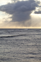 Fototapeta na wymiar Sun and cloud over sea.