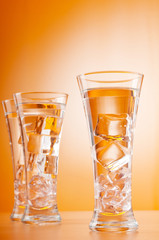 Water in the glass against gradient background