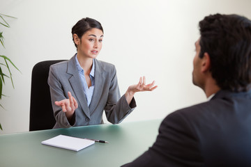 Manager interviewing an employee