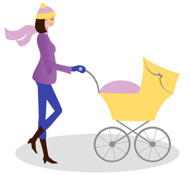 Young woman with baby stroller walking down the street in winter