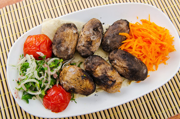 Baked potatoes in the plate