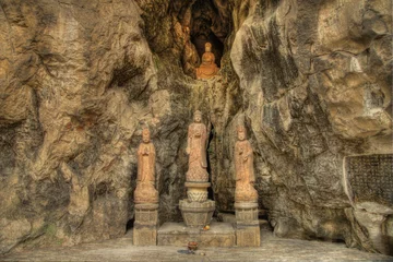 Poster carved buddha sculptures in seven star park cave guilin © gringos