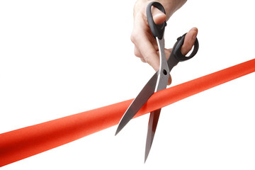 cutting a red ribbon