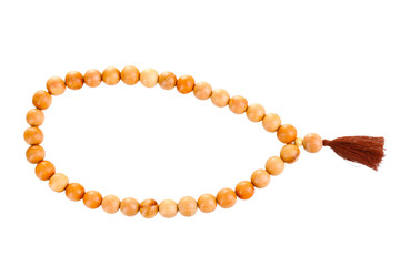 Wooden rosary isolated on white