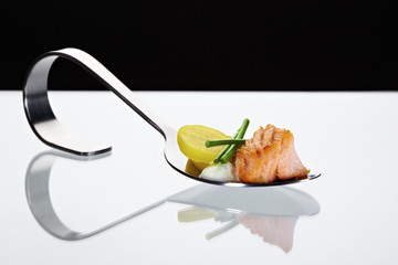 Spoon with salmon