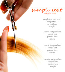 scissors cutting lock of hair