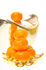 Tangerines and  ingots close up