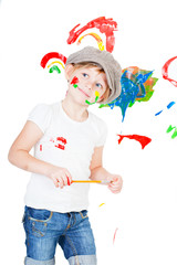 girl in a white T-shirt and a cap bedaubed with bright paints