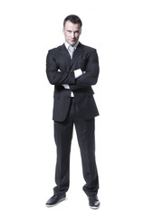 Obraz na płótnie Canvas Smart young businessman in black suit