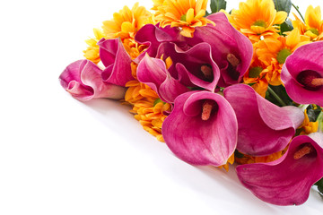 bouquet of calla lilies and orange chrysanthemums