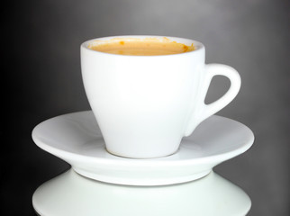 cup of coffee on gray background