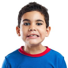 Portrait of a small hispanic boy missing a teeth