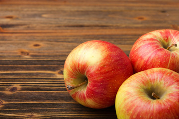 Naklejka na ściany i meble apples on wooden table