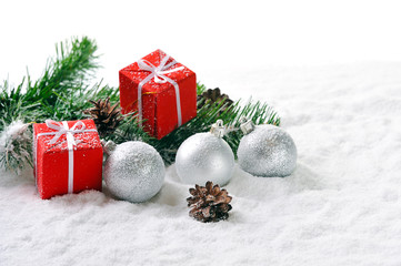 Fototapeta na wymiar Christmas gifts on snow