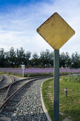 Railway junction with warning sign