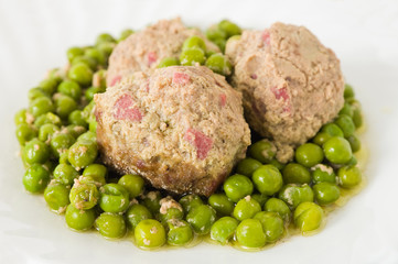 Meatballs with peas.