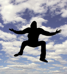 Fototapeta na wymiar Jumping Man Silhouette
