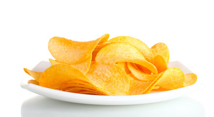 Fototapeta na wymiar Delicious potato chips on plate isolated on white
