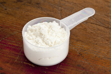 measuring scoop of white powder