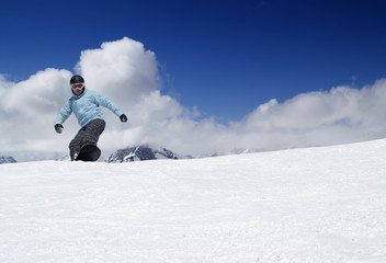 Fototapeta na wymiar Snowboarding in high mountains