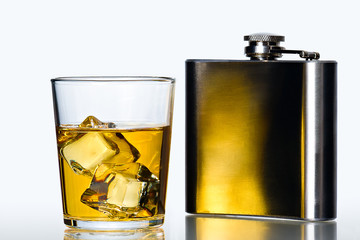 Hip flask and Whisky on the rocks