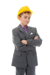 Little smiling builder in helmet