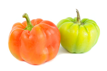 Red and Green Bell Peppers Isolated on White Background