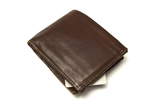 Brown wallet and credit card