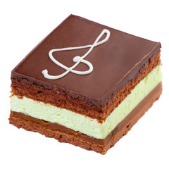 Chocolate cake with a treble clef sign made with cream