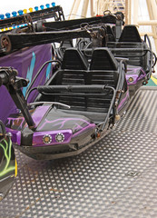 The Carriages and Seats on an Exciting Fun Fair Ride.
