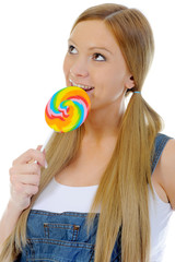 happy curly  woman with a lollipop