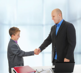 Fototapeta premium Handshake man and boy