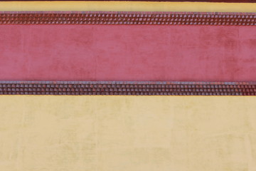 Оштукатуренная кирпичная стена