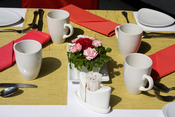 Table arrangement in an expensive haute cuisine restaurant