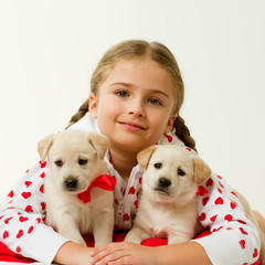 Best friends - portrait of  girl with cute puppies