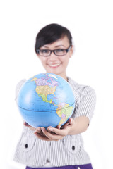 Pretty Asian woman holding a globe