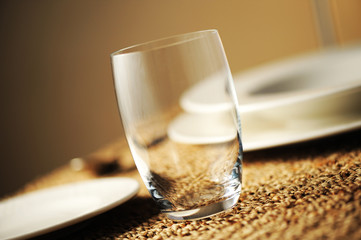 glass on table, close up, soft focus