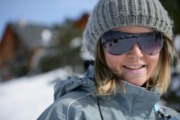 Portrait of a young woman at ski resort