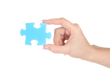 Blue puzzle with a hand isolated on white
