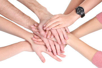 group of young people's hands isolated on white