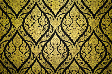 Thai floral pattern textured on a wall