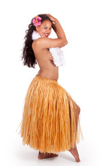 Young hula dancer looking over her shoulder