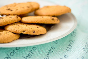 chocolate chip cookies on blue table set