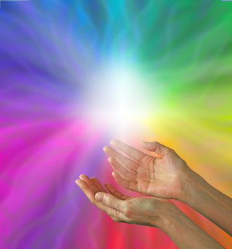 Hands and cross on rainbow background