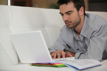 Man studying at home