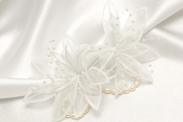 Fototapeta na wymiar textile wedding background with pearls
