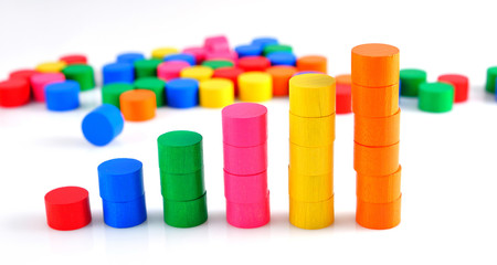 Colorful diagram made from wooden blocks.